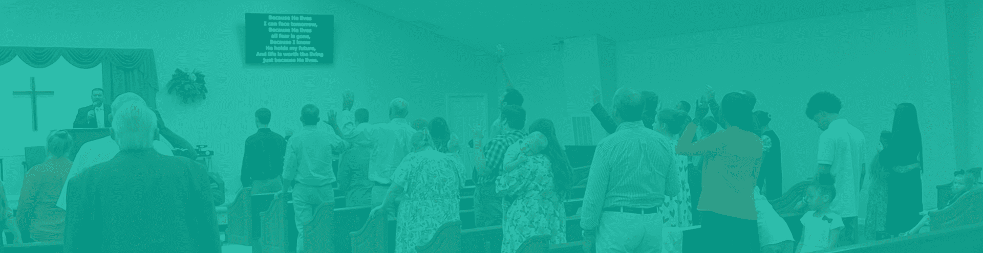 Congregation standing in church during service.