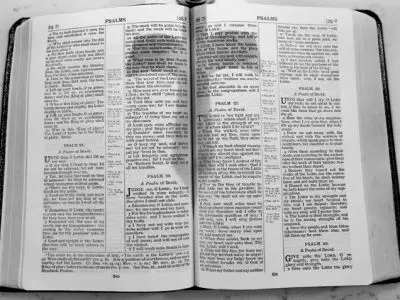 Open Bible showing the Book of Psalms.