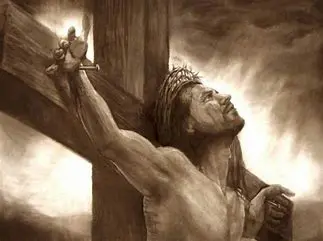 Man on cross with crown of thorns.