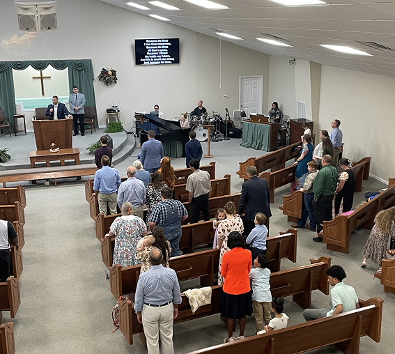 Congregation gathered in a church for worship.