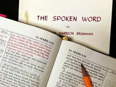 Open book with highlighted Bible verses.