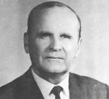 Elderly man in suit, formal portrait photo.