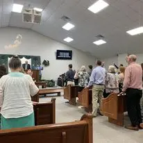 Congregation standing during worship in church