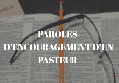 Glasses on open book with French text.