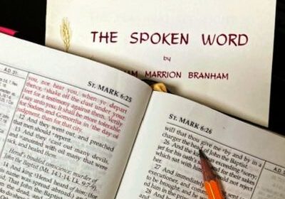 Open Bible and "The Spoken Word" booklet.