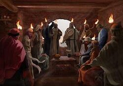 People gathered in a room with torches.