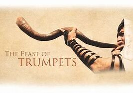 Man blowing shofar for Feast of Trumpets.